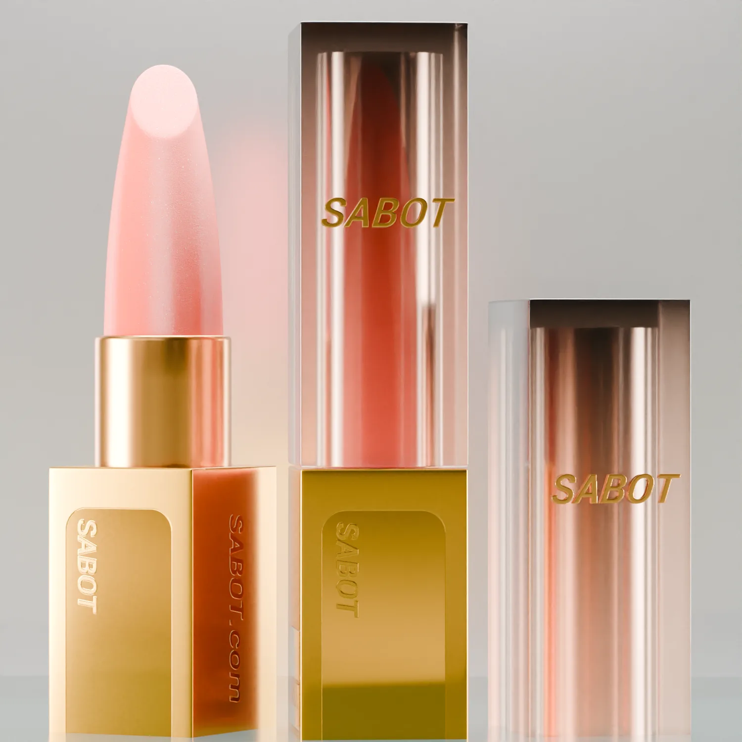 Trois rouges à lèvres SABOT, packaging doré