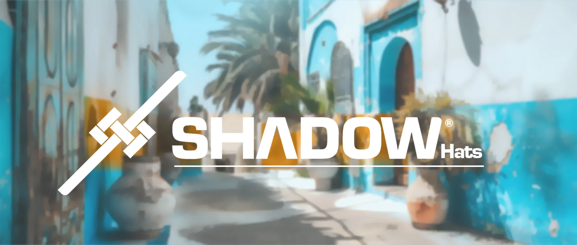 Logotype Shadow Hats sur une ruelle blanche et bleue de Tunis